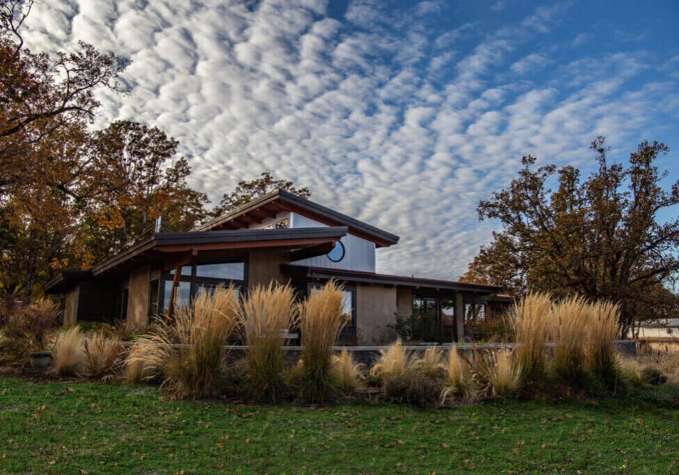 A clerestory roof is a roof with a vertical wall which sits between the two sloping sides, which features a row of windows (or one long, continuous window).